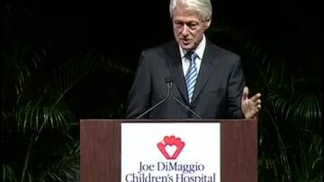 President Bill Clinton receives Joe DiMaggio’s American Icon Award